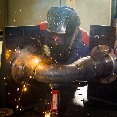 soldador-trabalhando-com-aco 3 Professional welder working with steel structures - Industrial Worker at the factory